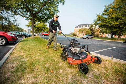 Commercial Landscaping Crew Push Mower Lawn Care Parking Lot Maintenance