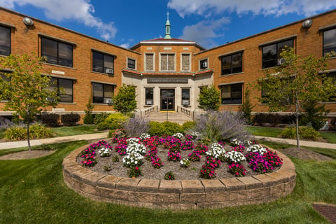 School front landscape with flowers